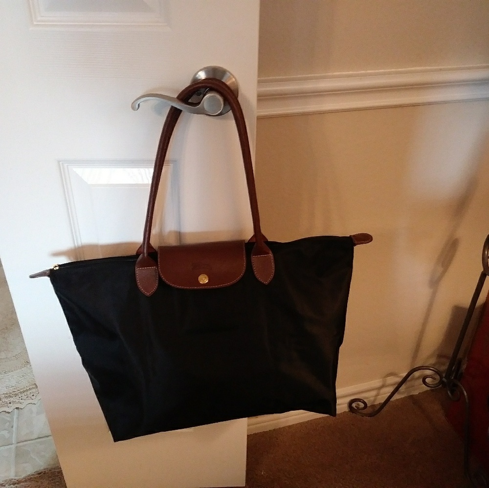 Longchamp black canvas bag that folds up. 19"x15"x